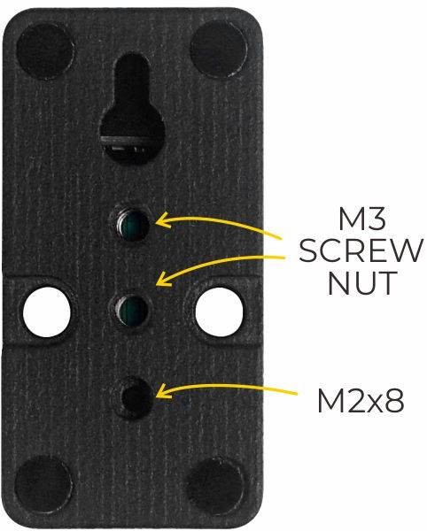 'Black metal plate with two marked screw holes, an 