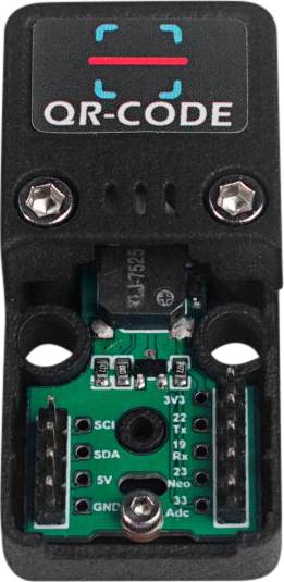 Electronic component with QR code module, showing circuit tracks and connections on a small circuit board.