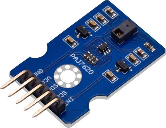 Blue sensor module with multiple electrical components and four gold-coloured pins for connection. Labelled with 'PAJ7620'.