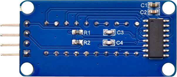 Electronic circuit on a blue printed circuit board with multiple resistors, capacitors, and an integrated circuit.
