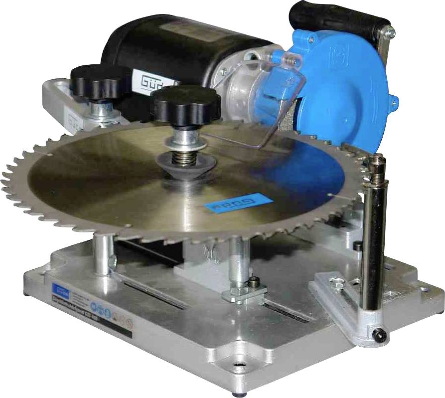 Circular saw with blue protective casing and two black handles, mounted on a metal base.