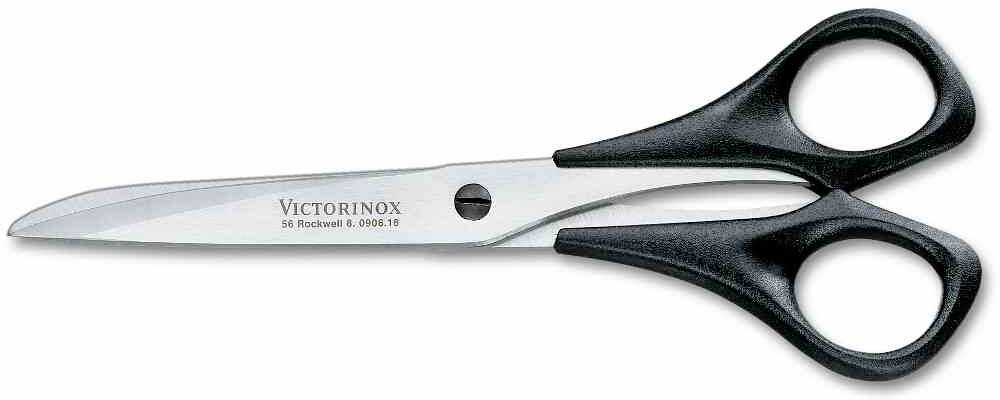 A pair of scissors with a black handle and silver blades, on which 'VICTORINOX' is written. Suitable for cutting paper or fabric.