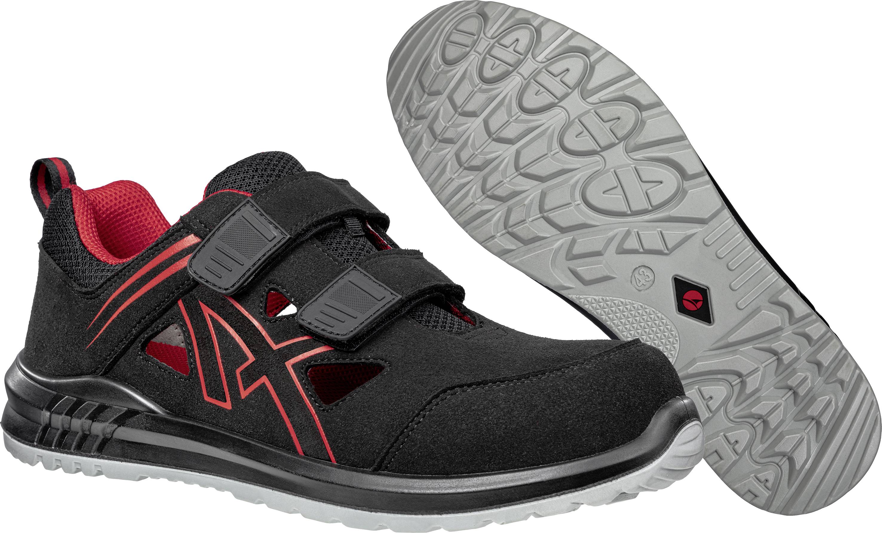 Black sports shoe with red details and velcro fastening, shown from the side and underneath. Grey sole with non-slip tread.