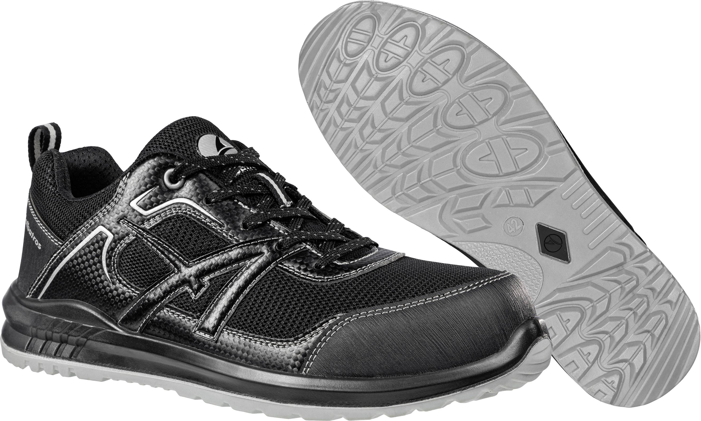 Black, sporty safety shoe with a profiled sole, side logo application, and lace-up fastening, suitable for slippery surfaces.
