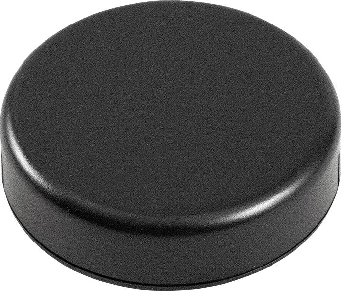 Black ice hockey puck on a white background.