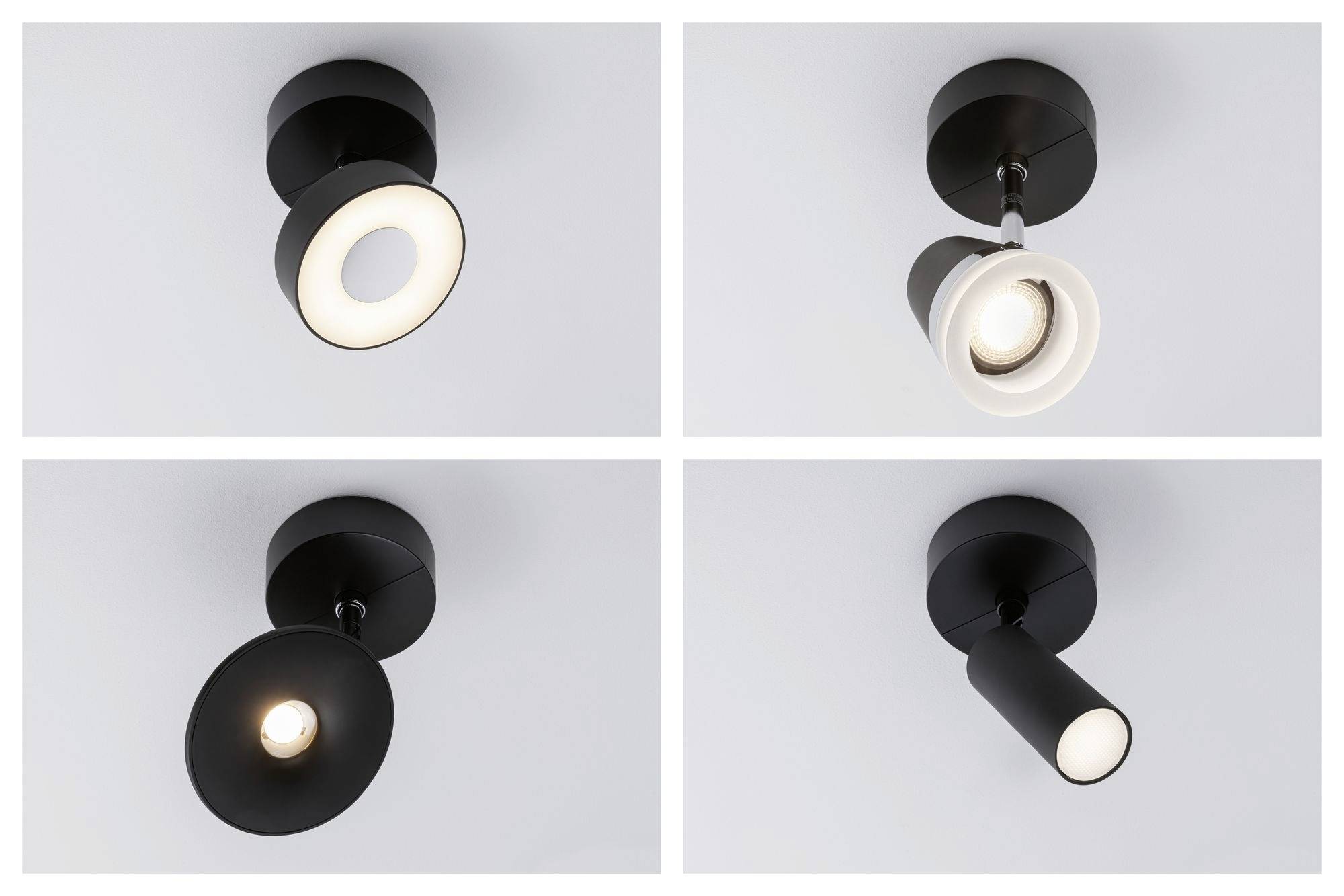 Four black ceiling lights, each with a different design: round, conical, cylindrical, and with an open ring. All are mounted on the ceiling.