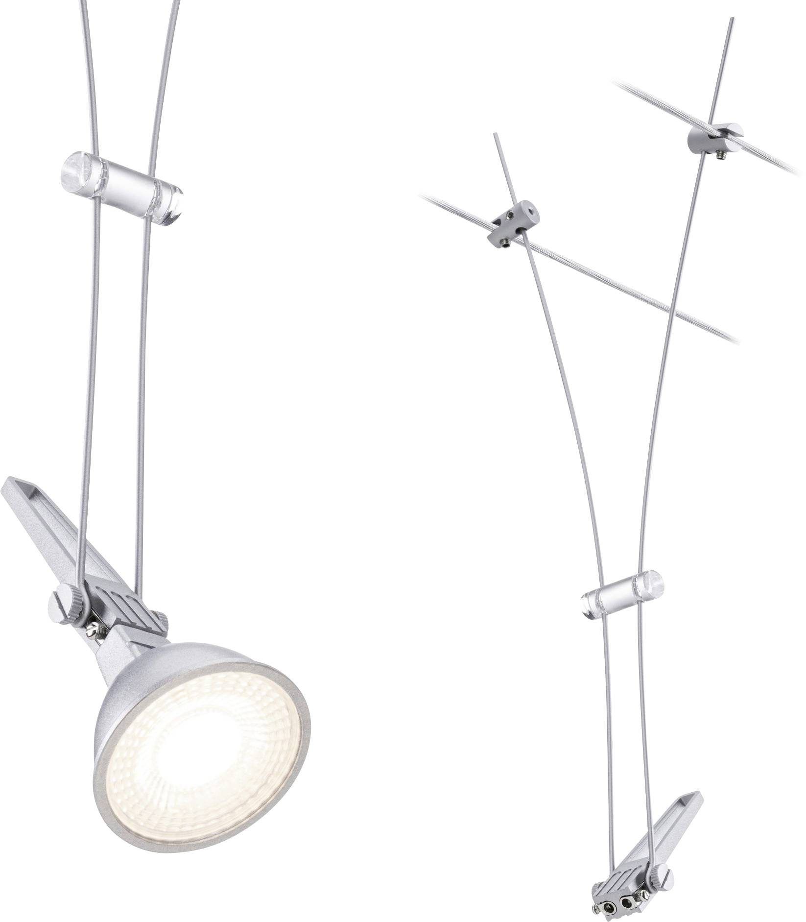 A modern rail system with adjustable LED spotlights, mounted on cables, ideal for flexible lighting solutions.