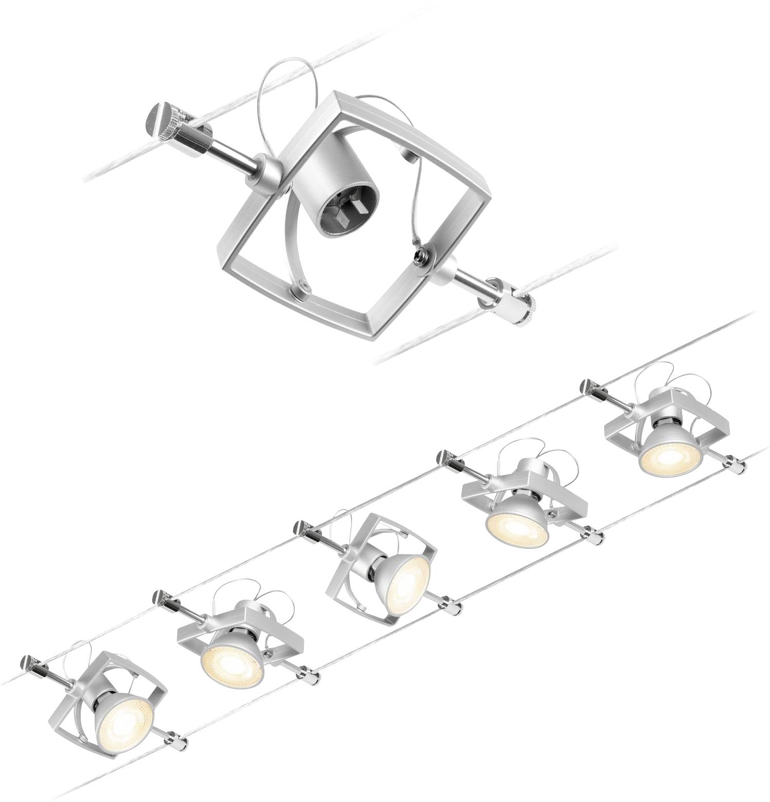 Four silver, ceiling-mounted spotlight fixtures in a row. Each lamp has a square frame and is adjustable.