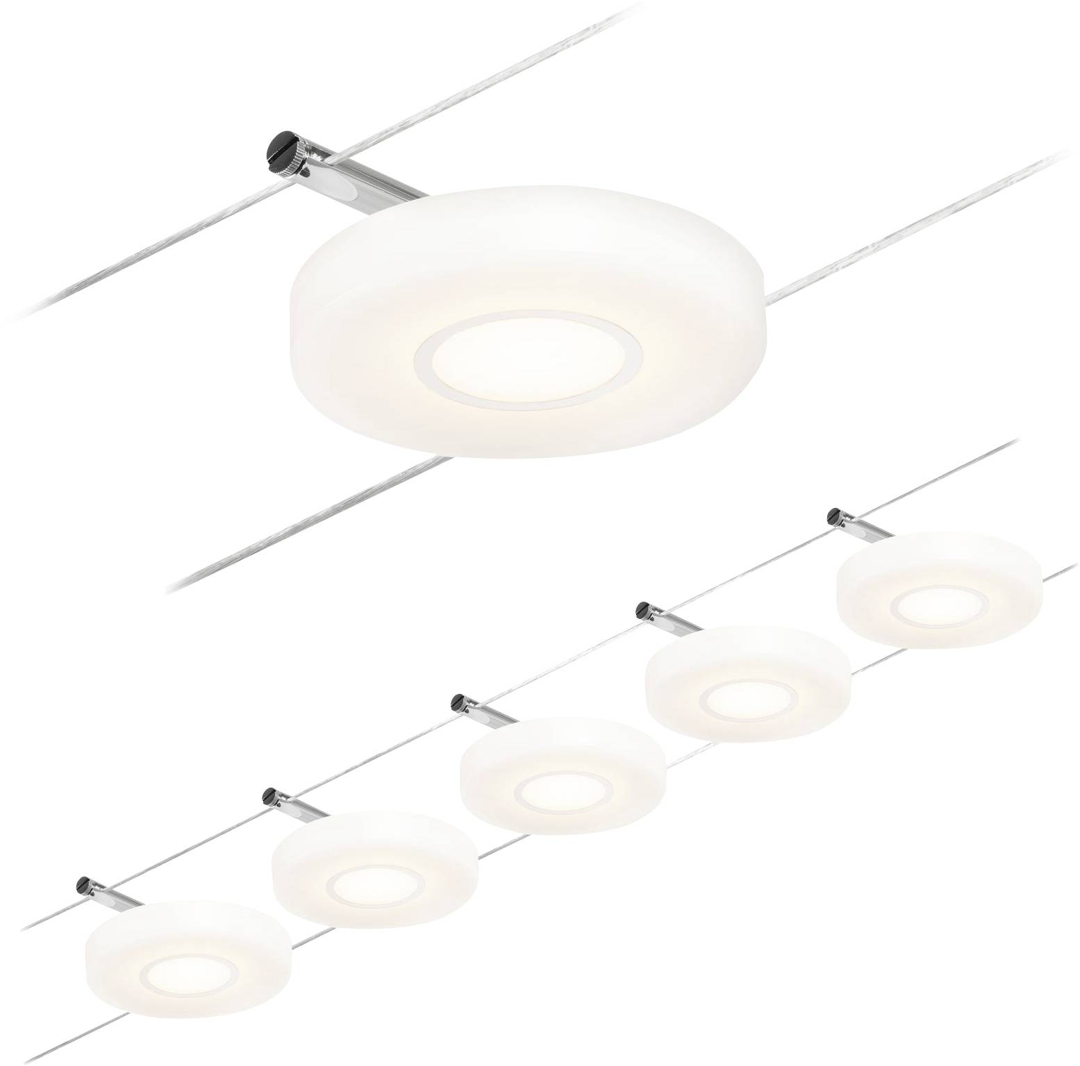 Five round ceiling lights are mounted in a row on a track system, evenly distributed throughout the room.