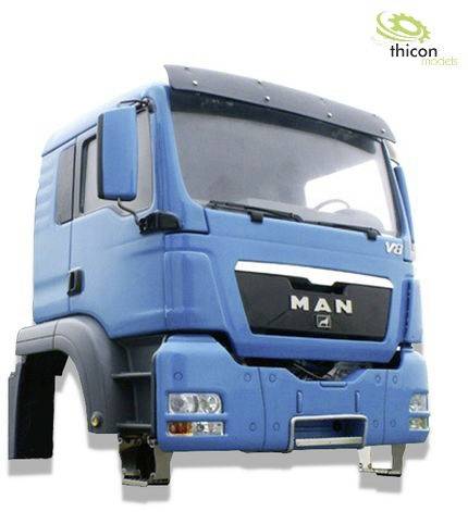 Blue MAN truck cab model with a 'V8' print on the top surface. 'Thicon models' brand logo in the top right corner.
