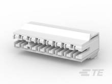 White, stacked plastic plates with serrated edges. The structure is reminiscent of cooling fins or a type of mechanical component.