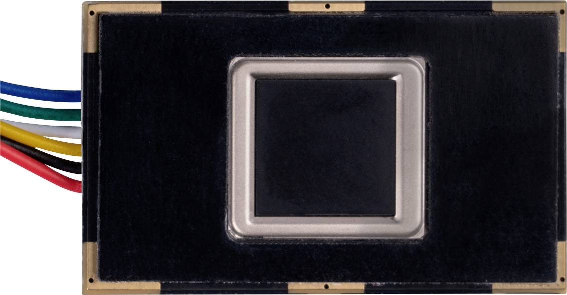 A rectangular electronic component with multiple coloured cables on the left: blue, green, yellow, red, and black.