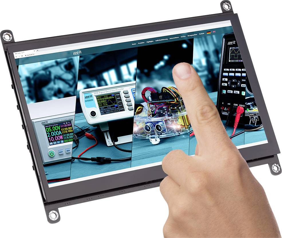A hand points to a screen with electronic measuring instruments used in a laboratory.