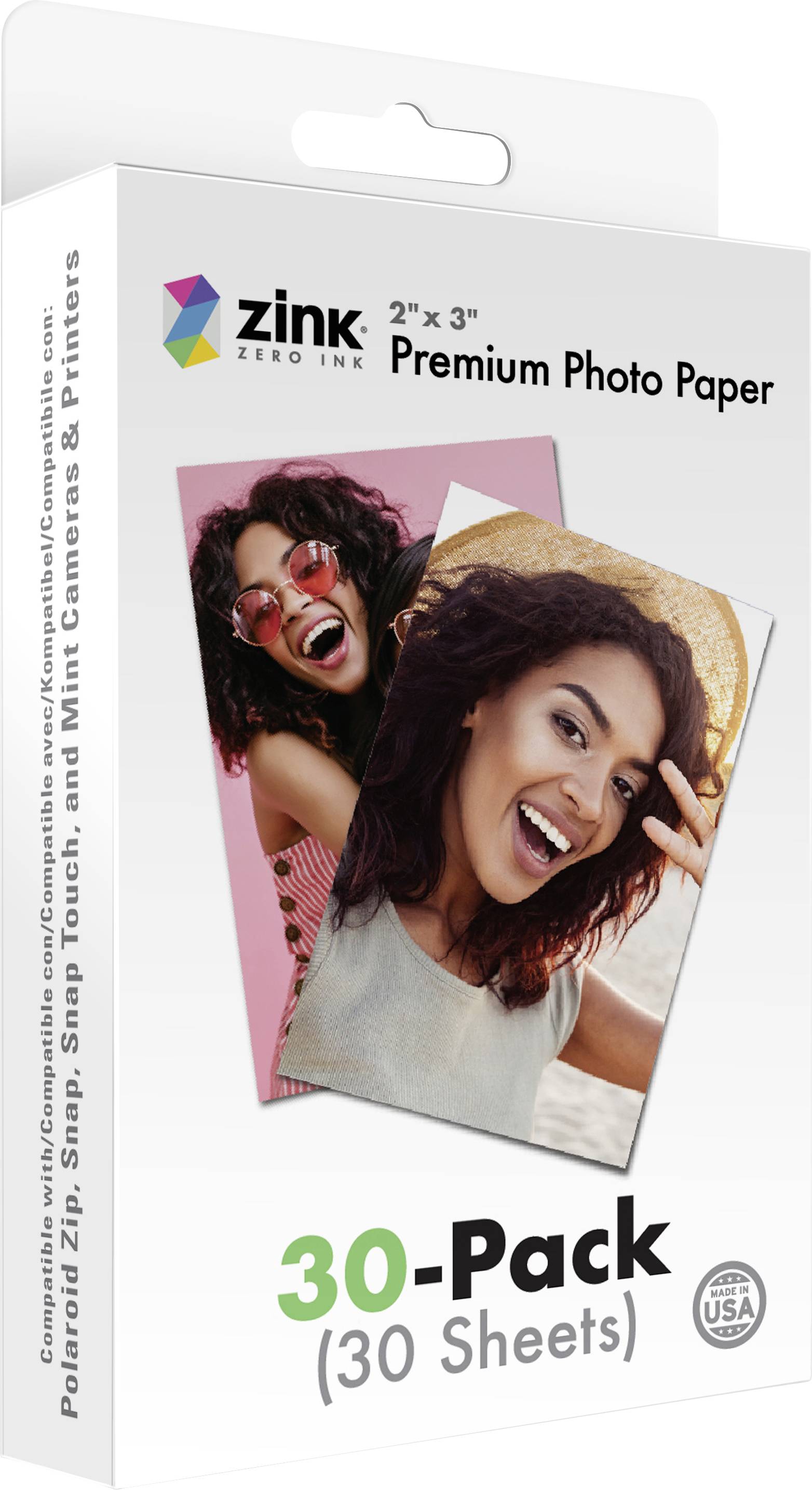 Packaging of Zink Premium Photo Paper, 30 sheets, showing two smiling people in printed photos, compatible with Polaroid Zip.