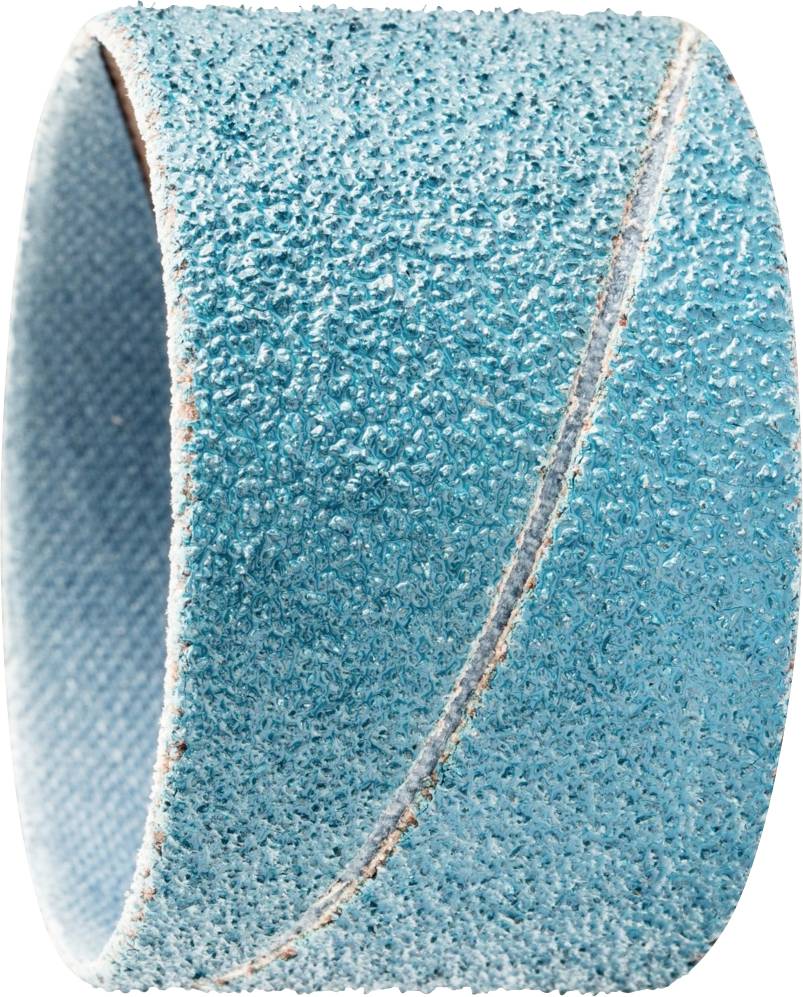A green-blue sanding band in close-up with a rough, textured surface, used for wood and metal processing.