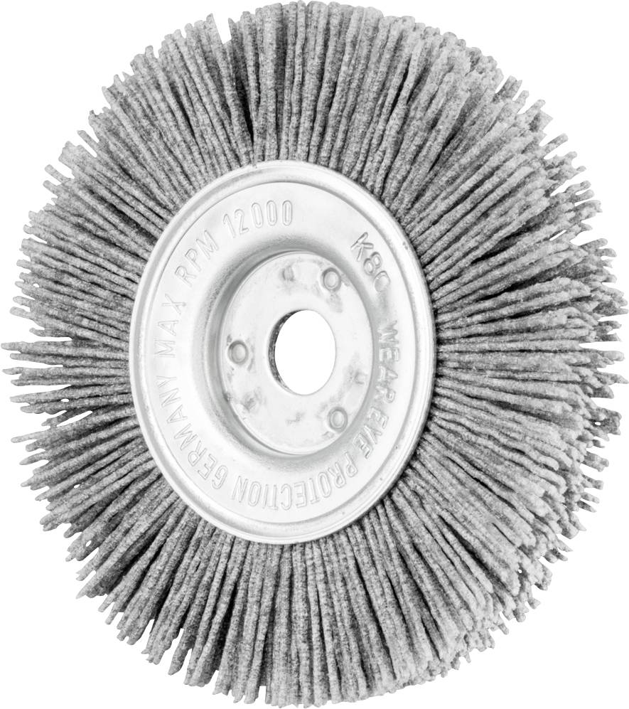 A grey cleaning brush with a round metal centre part and radially arranged bristles, suitable for surface processing.