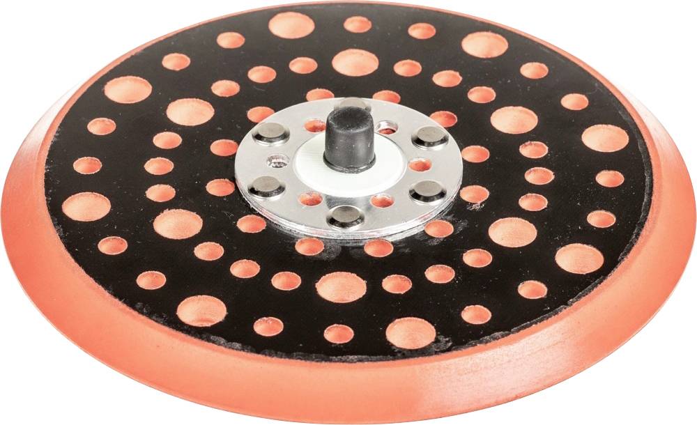 Black sandpaper with numerous holes, bordered in orange, on a sanding machine, used for surface treatment.