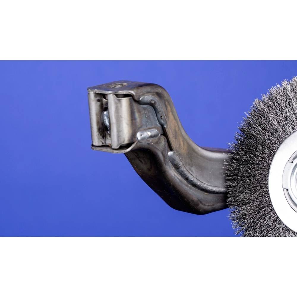 A close-up of an angle grinder with a wire brush against a blue background.