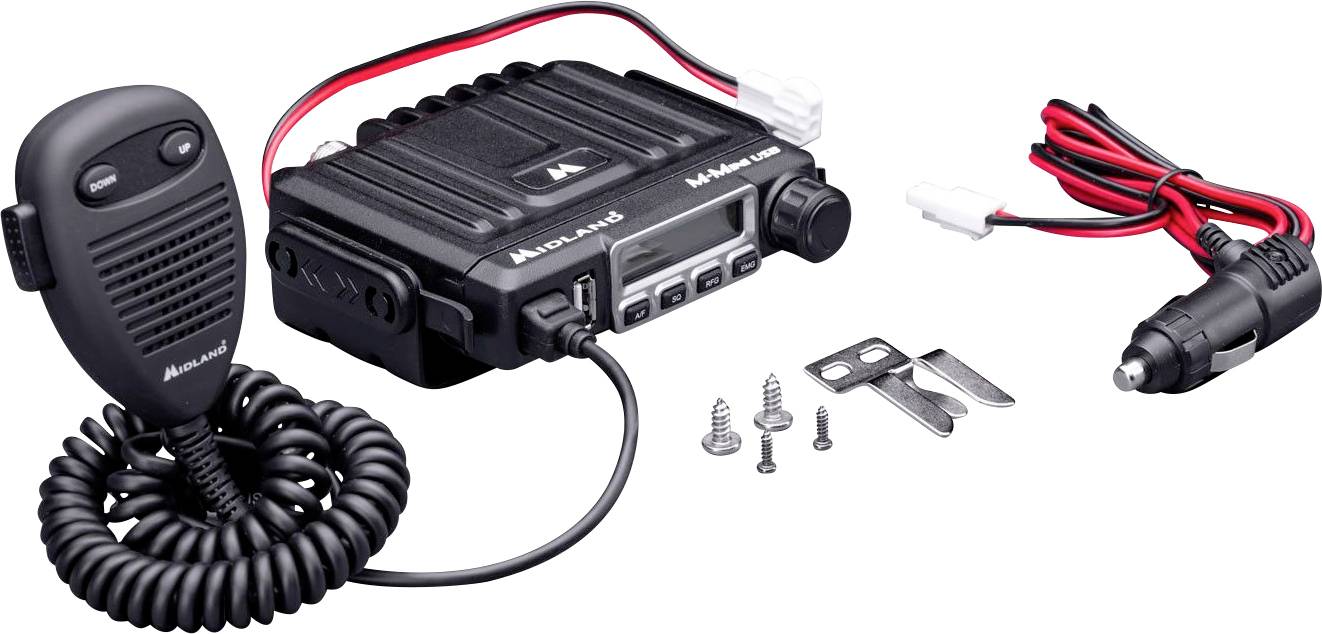 A radio set with microphone, power cable, screws and clamps, ready for installation in a vehicle.
