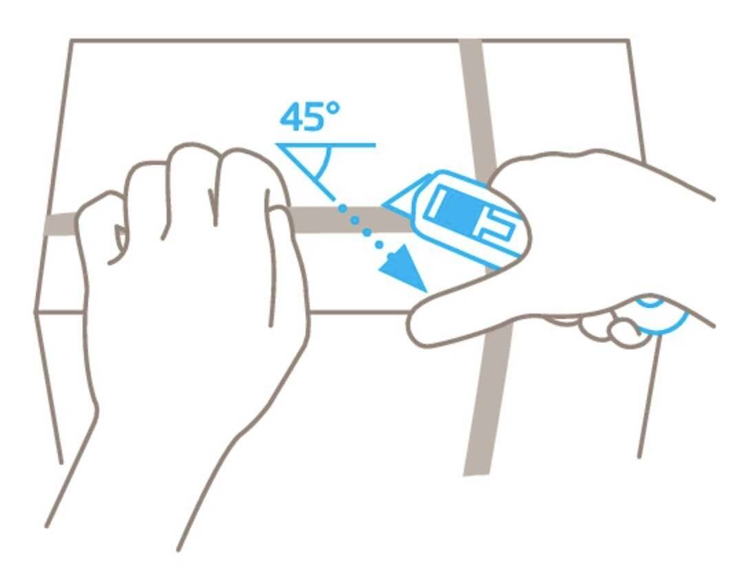 Two hands, one holding a protractor over an edge, the other holding the edge. The protractor shows 45 degrees.