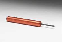 A red cylindrical metal rod on a grey background. A thin black rod protrudes from one end of the cylinder.