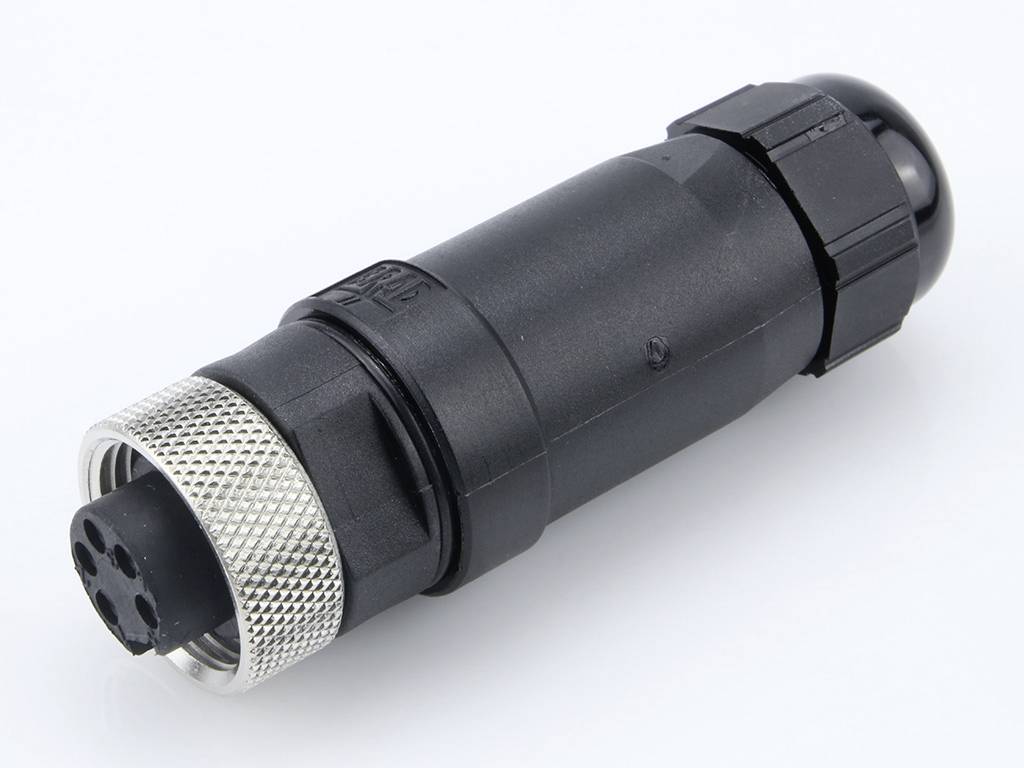 A black, cylindrical plug with a five-pin connector and silver threading for electrical connections.