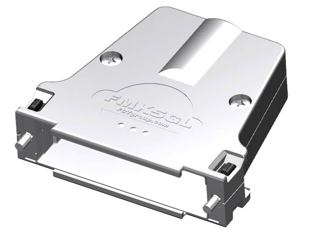 A silver electronic component with a rectangular shape and connections on the side. 'FM, AST, Super Stealth' is embossed on the surface.