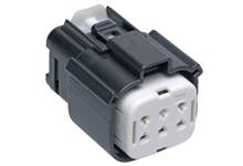 A black electric socket adapter with multiple socket outlets, suitable for specific connection requirements.