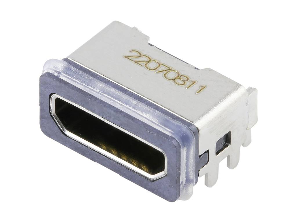Silver-coloured HDMI port for electronic devices, metal casing, rectangular shape with gold contacts.