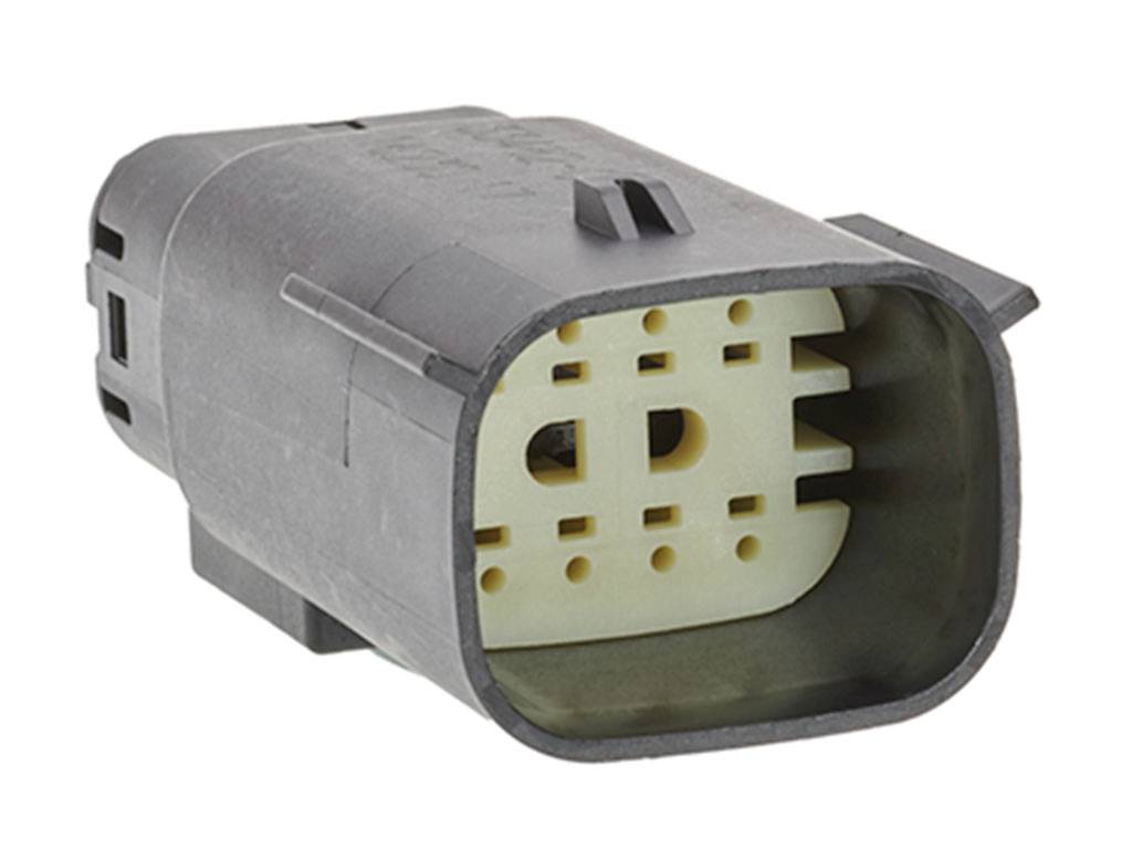 Black plastic plug with a rectangular profile and multiple internal connection points, for use in electrical devices.
