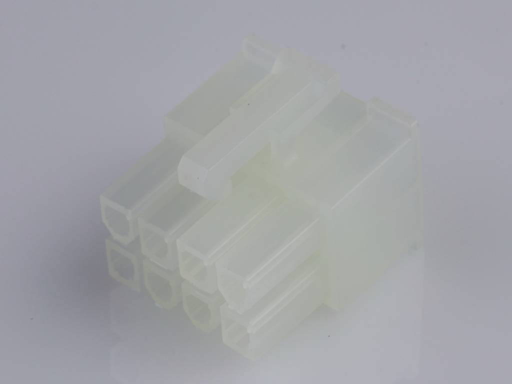 A white, six-pin plastic plug in close-up, set against a grey background. The plug is unmarked and without a cable.