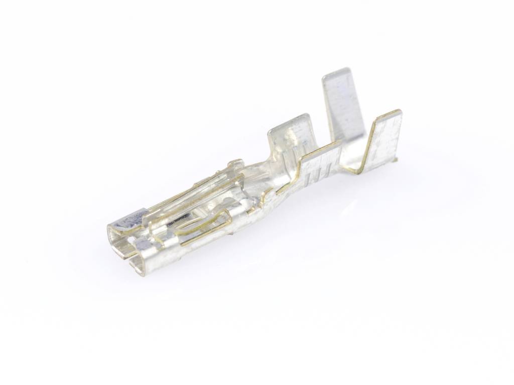 A metallic connector with two side clips rests on a white background. It is designed for electrical connections.