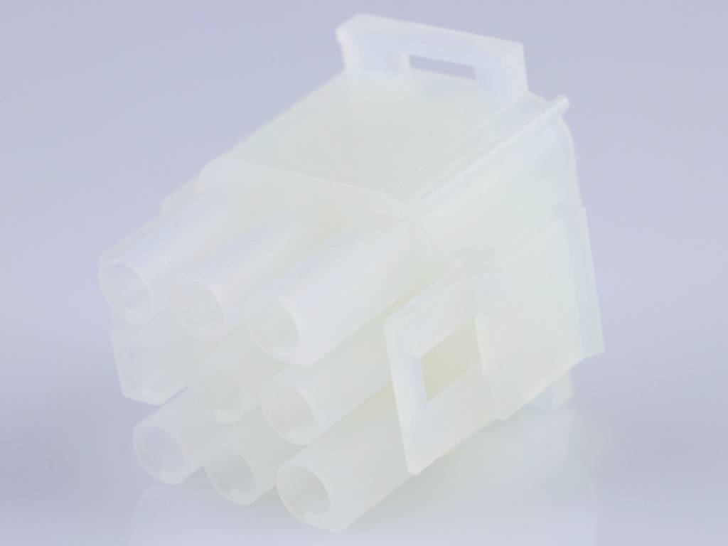 A white, transparent plastic plug with six openings, likely for electronic connections.