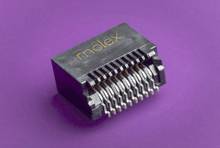 A black electronic connector with the word 'molex' printed on a purple background.