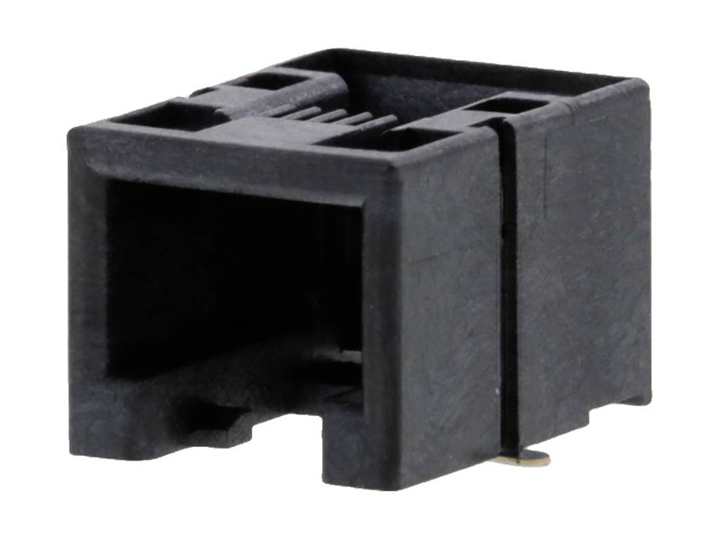 Black plastic plug, square-shaped, viewed from the opening. Used for connecting electrical components.