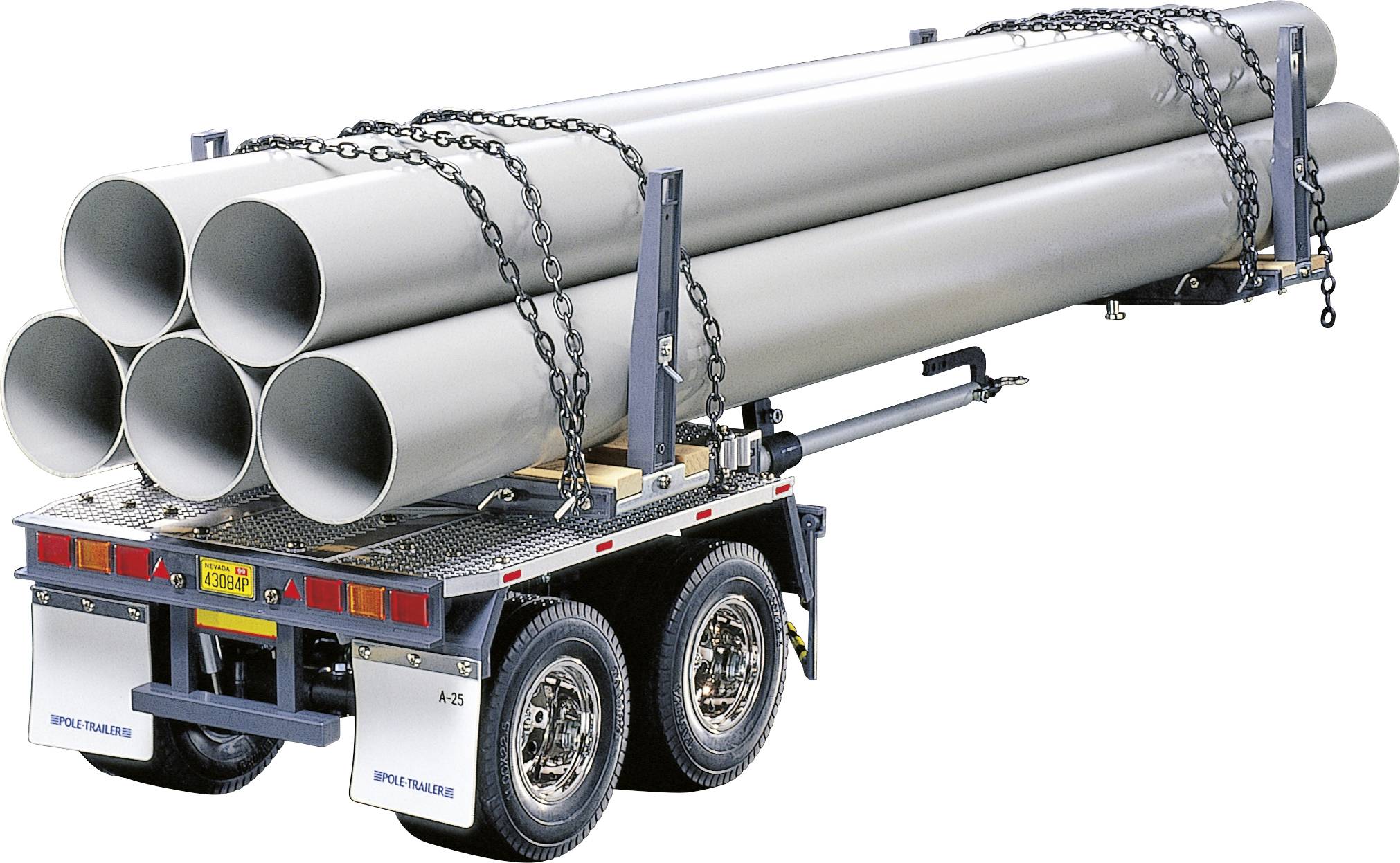 A lorry trailer is transporting large, grey pipes that are secured with chains. The trailer has two axles and is designed for heavy loads.