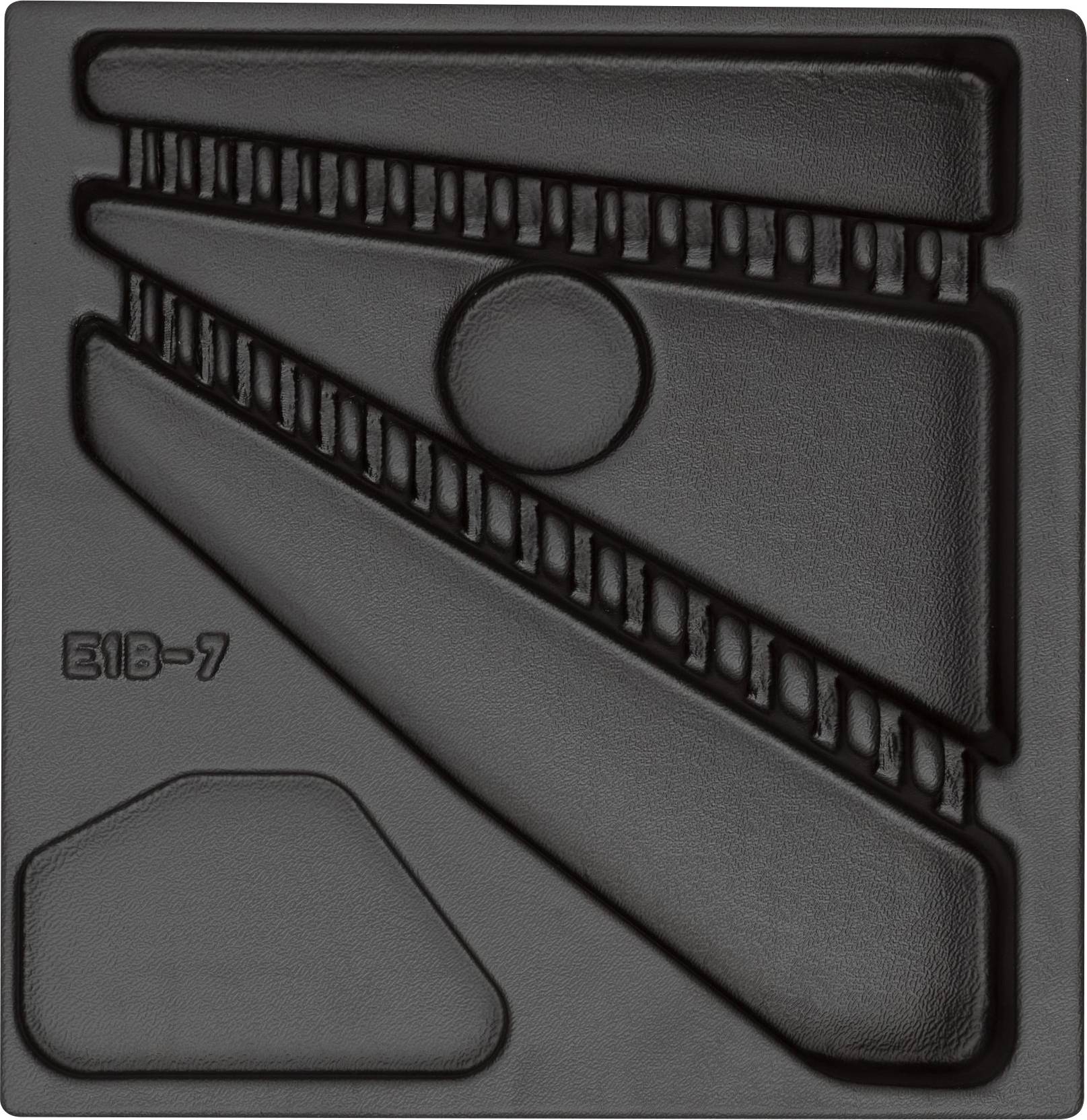 The image depicts a black, abstract relief with geometric shapes and a corrugated surface. The number 'E18-7' is shown in the bottom left.