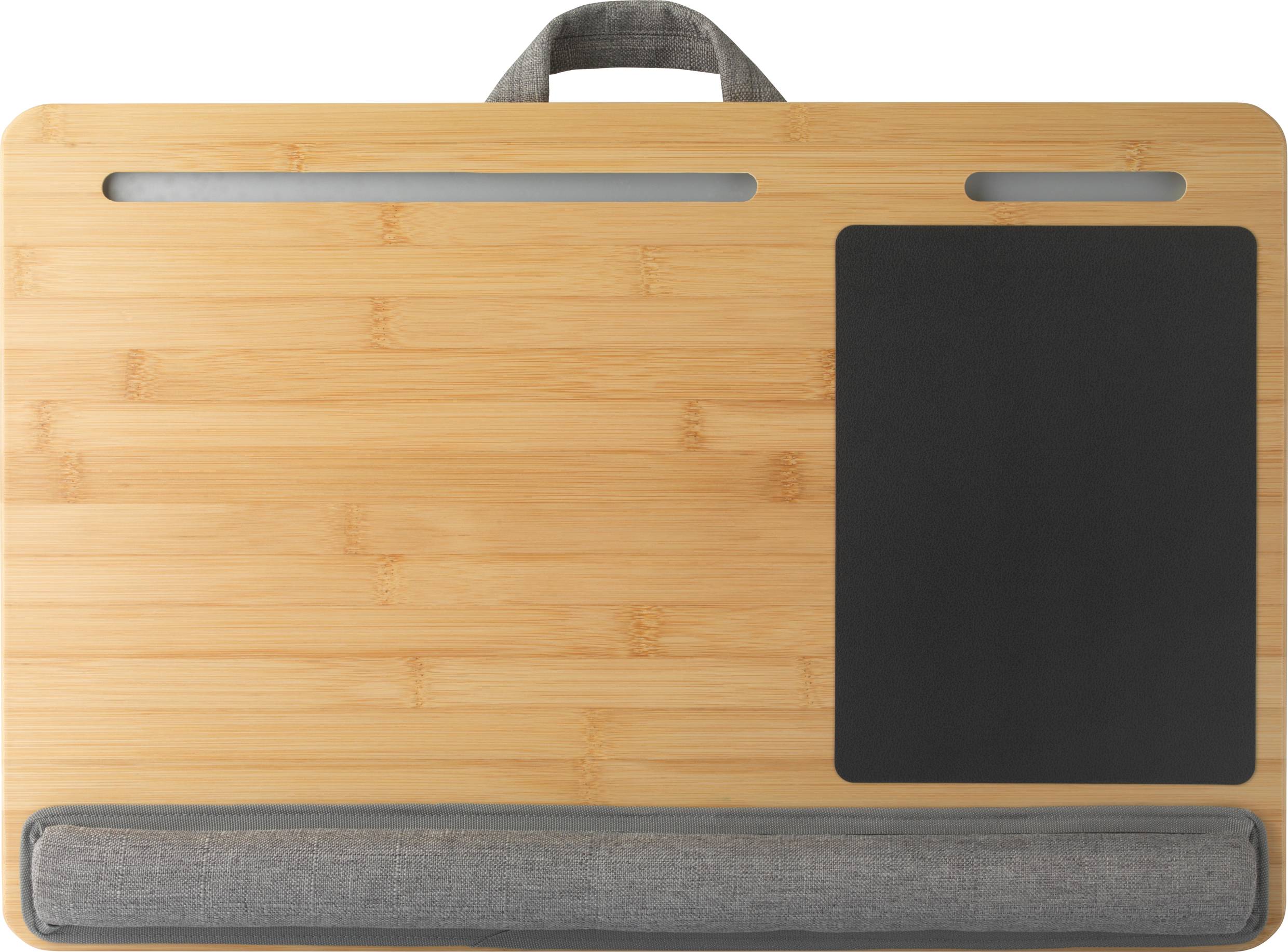 A portable wooden lap desk with a grey cushion underneath, mouse pad on the right. Perfect for comfortable working on the sofa.