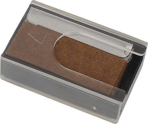 A transparent box contains spare blades.