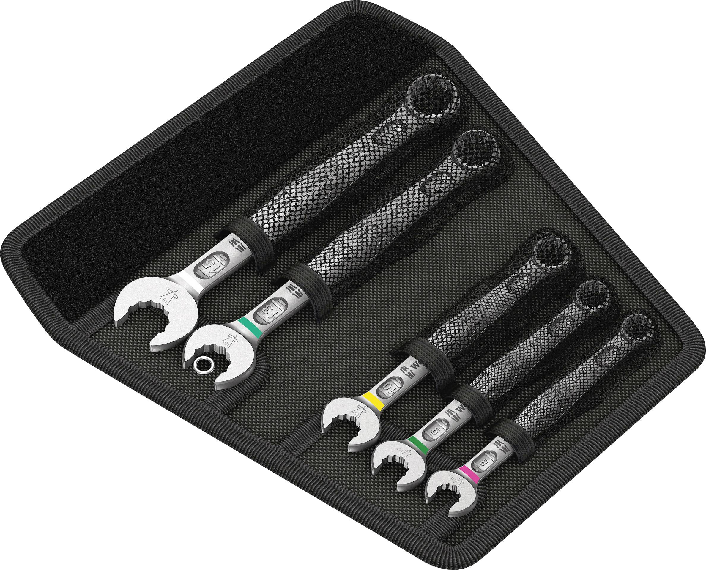 'Set of four spanners in different sizes, placed in a black, soft case.'Note: I've used 