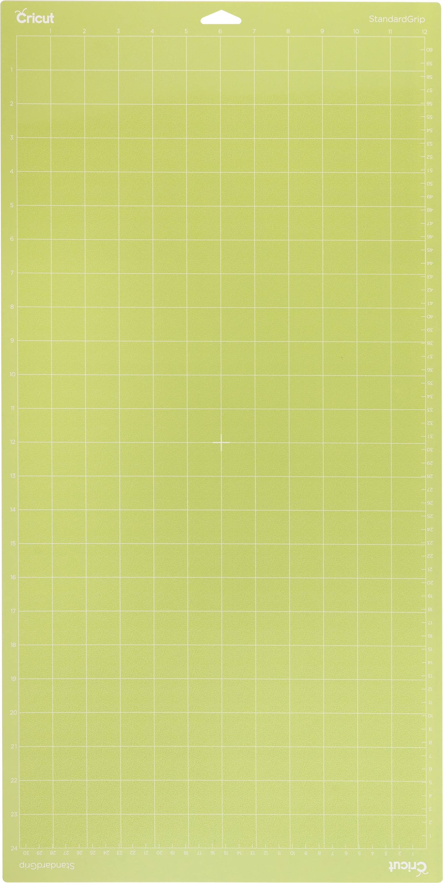 A green cutting mat with grid lines, suitable for crafting and cutting work.