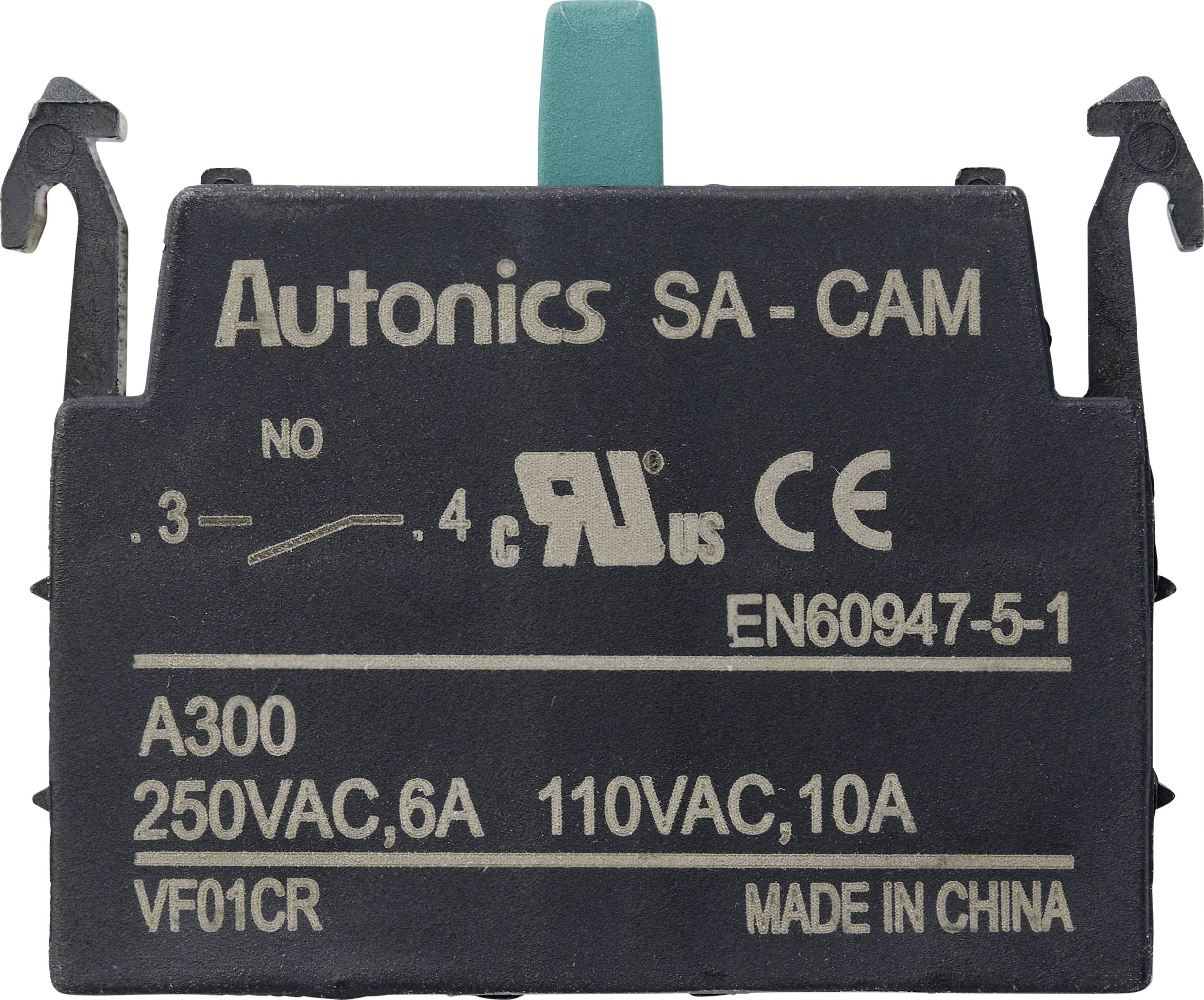 A black electric switch with the inscription 'Autonics SA-CAM'. Specifications such as voltage and current rating are indicated.