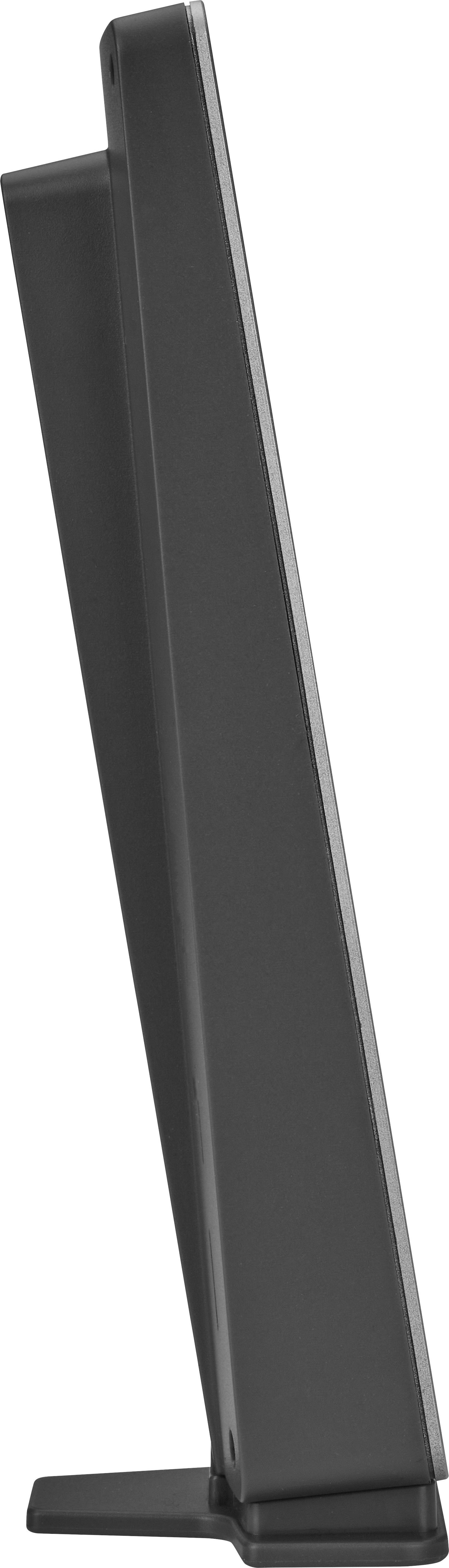 A modern, slim, black speaker viewed from the side, showcasing its sleek design and depth.