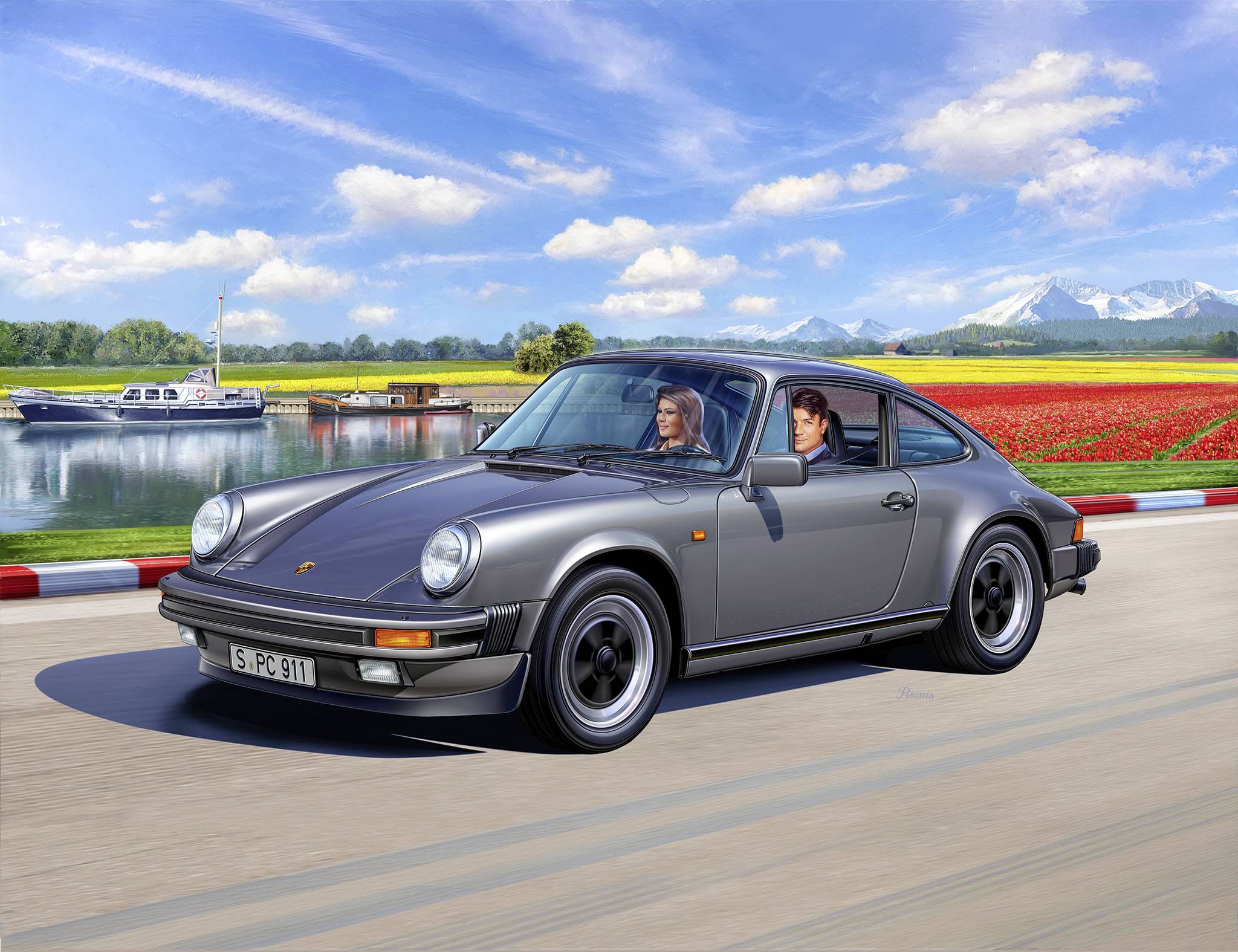 A silver Porsche 911 drives along a country road. In the background, a river, tulip fields, and mountains can be seen.