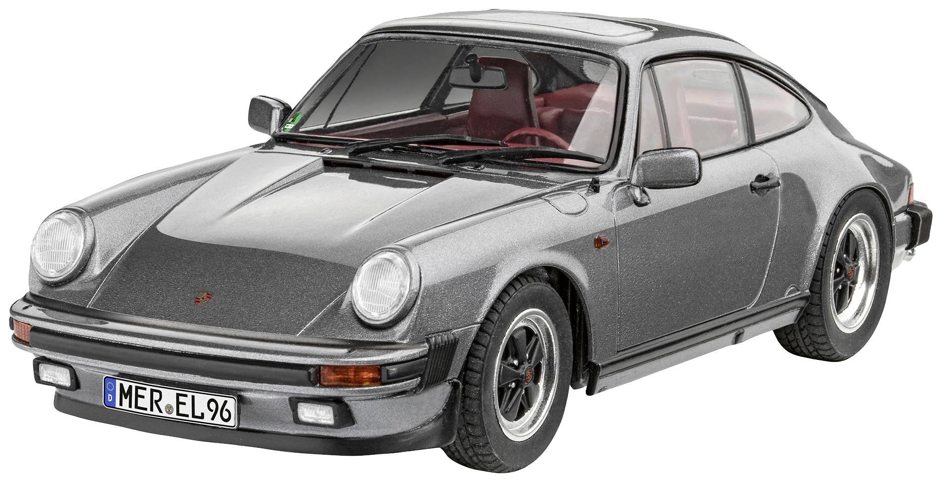 Silver, classic sports car with rounded headlights and red interior. Registration: 'MER-EL 96'.