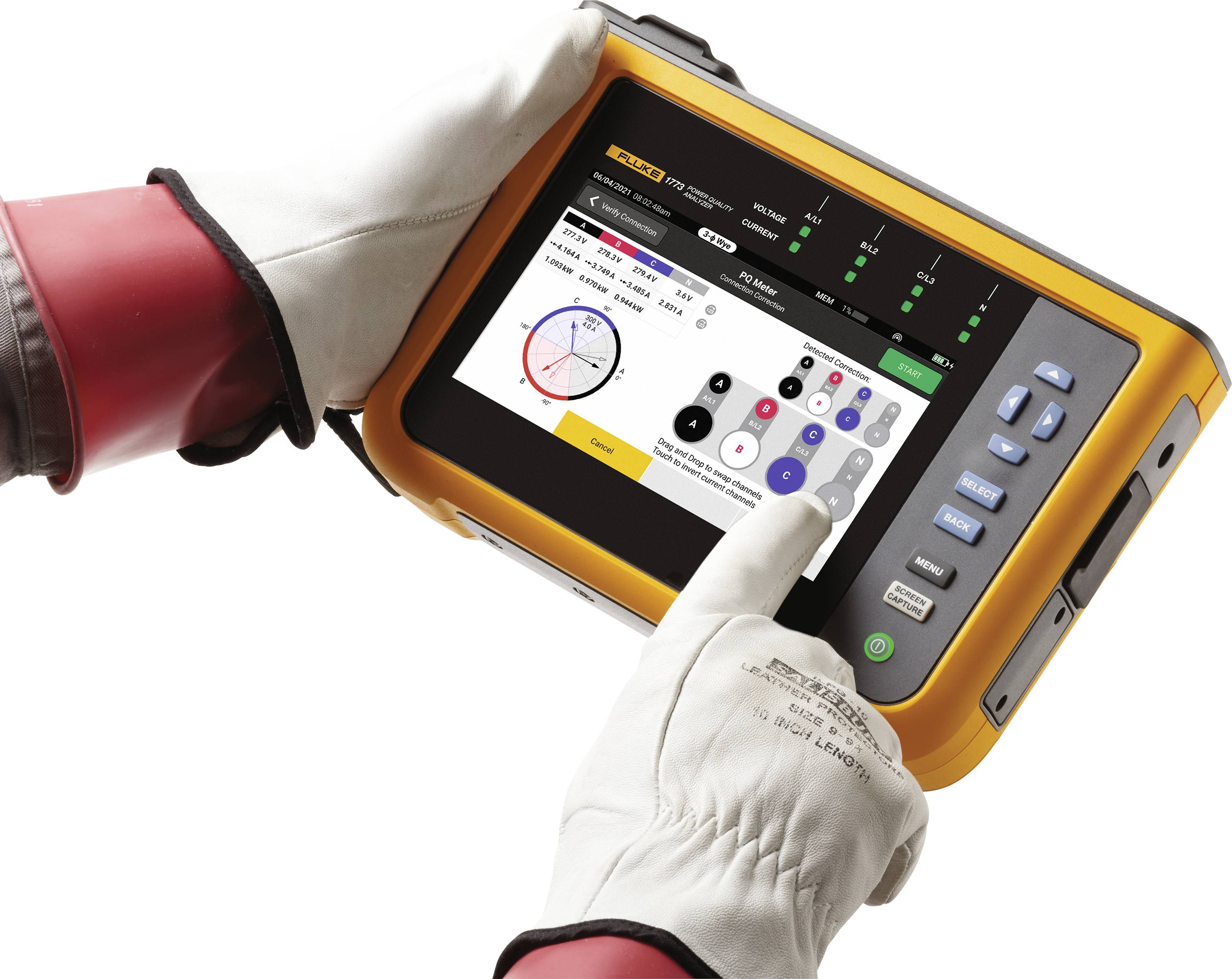 A person wearing gloves is operating a portable electronic testing device with a screen displaying measurement data and diagrams.