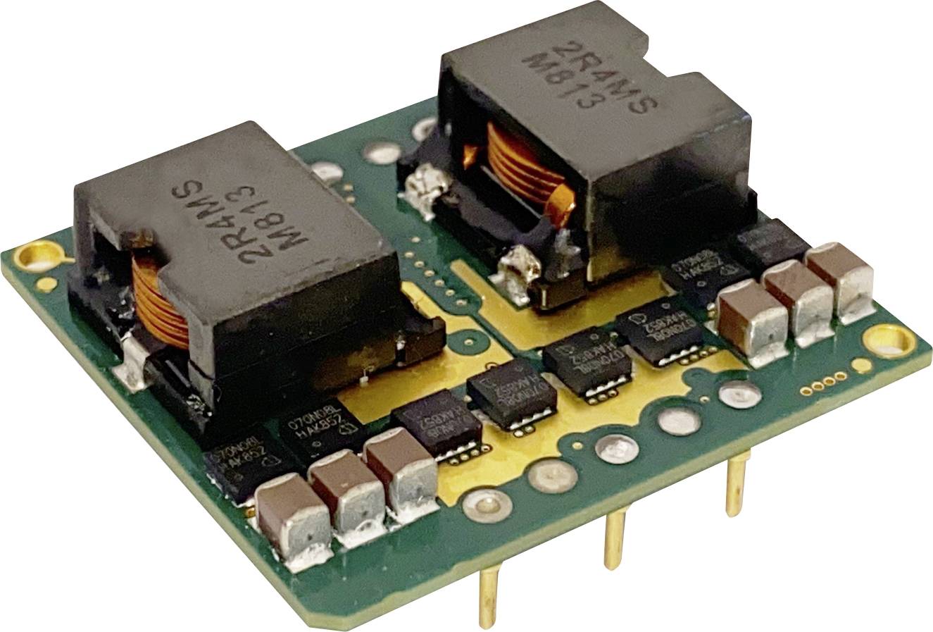 An electrical circuit board module with two black transformers, copper coils, and several small electronic components.