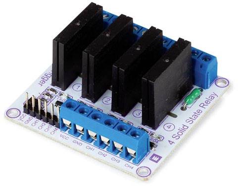 Four-channel solid-state relay module with blue terminal strip, black relay blocks, and wire connections, used for switching high loads.