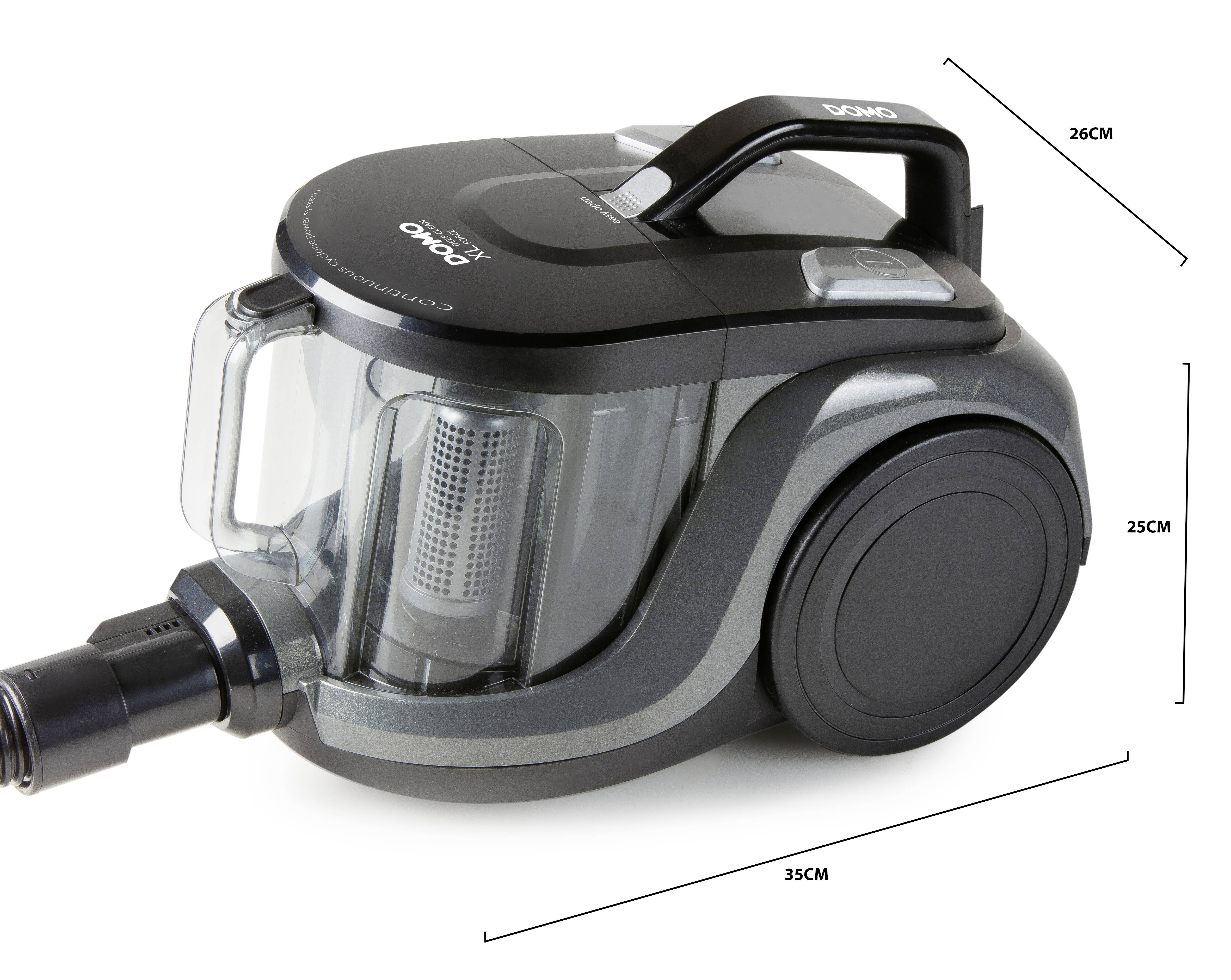 Cylinder vacuum cleaner with a black handle, in a compact design. Dimensions: 26 cm (height), 25 cm (width), 35 cm (length).