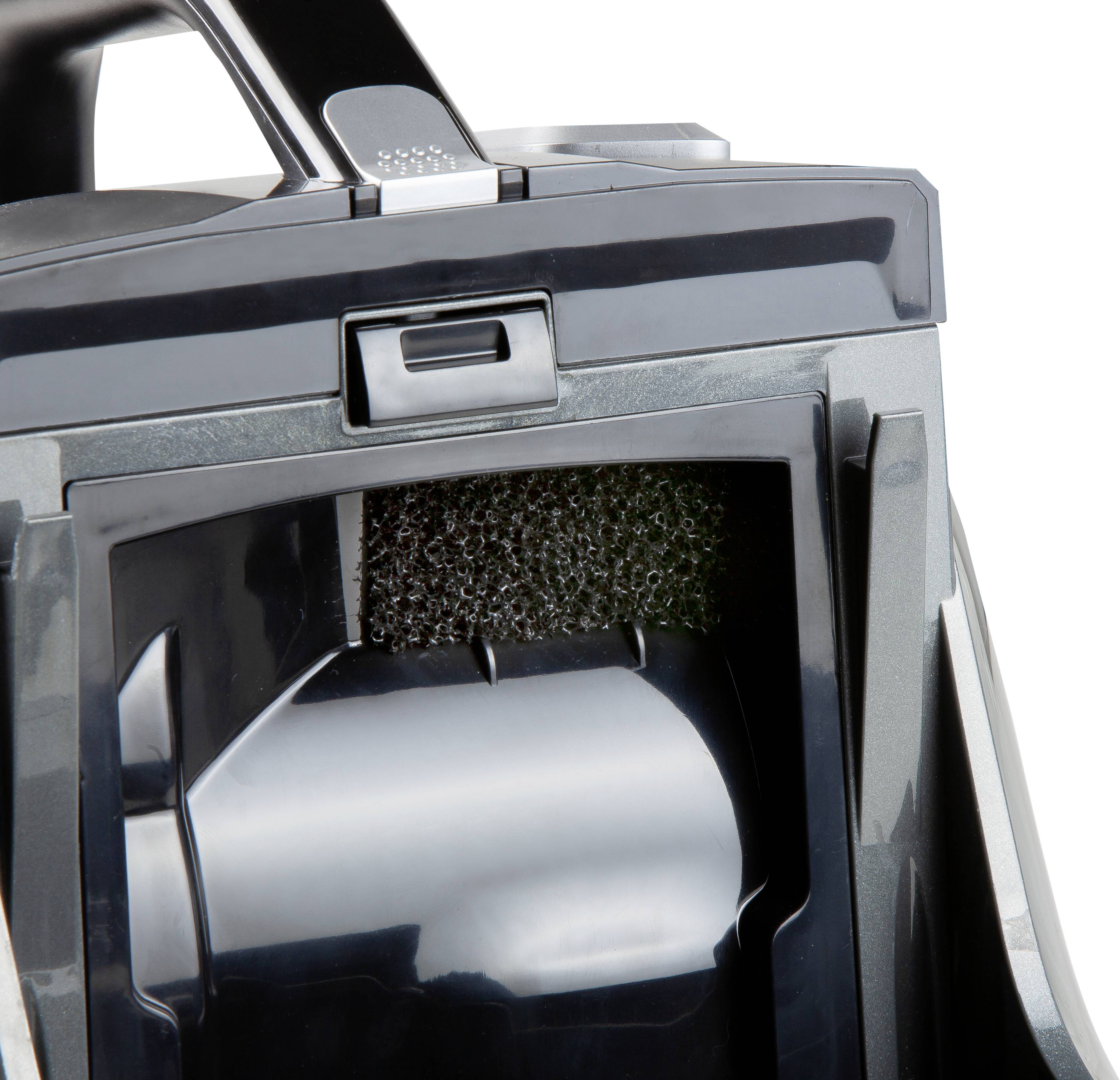 Close-up of a vacuum cleaner filter with black foam and plastic casing.